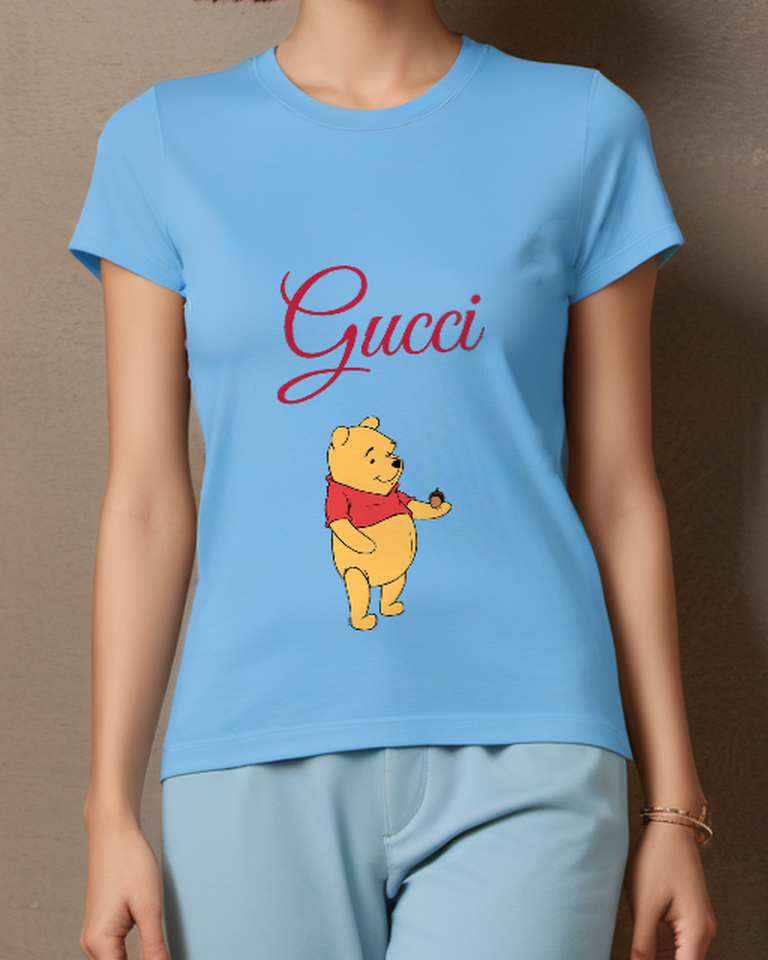 Sky Blue Winnie The Pooh Holding An Acorn Graphic T-Shirt - model wearing view