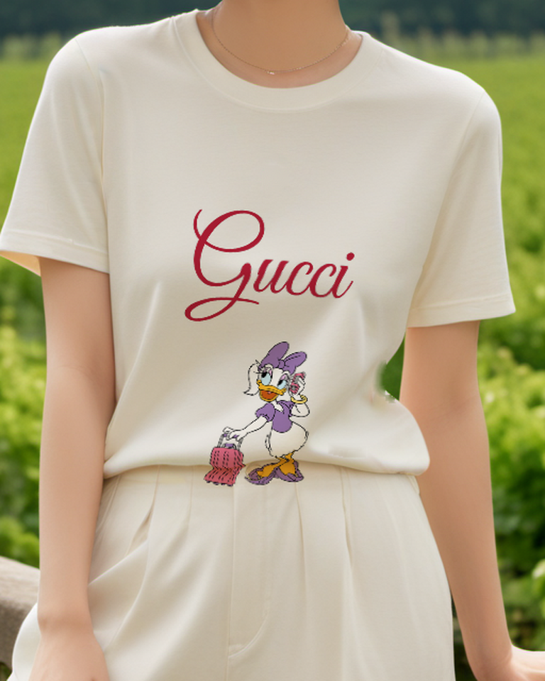 Ivory Daisy Duck On Phone With Suitcase Graphic T-Shirt - model wearing view