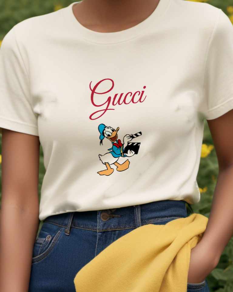 Ivory Donald Duck Holding Clapperboard Graphic T-Shirt - model wearing view