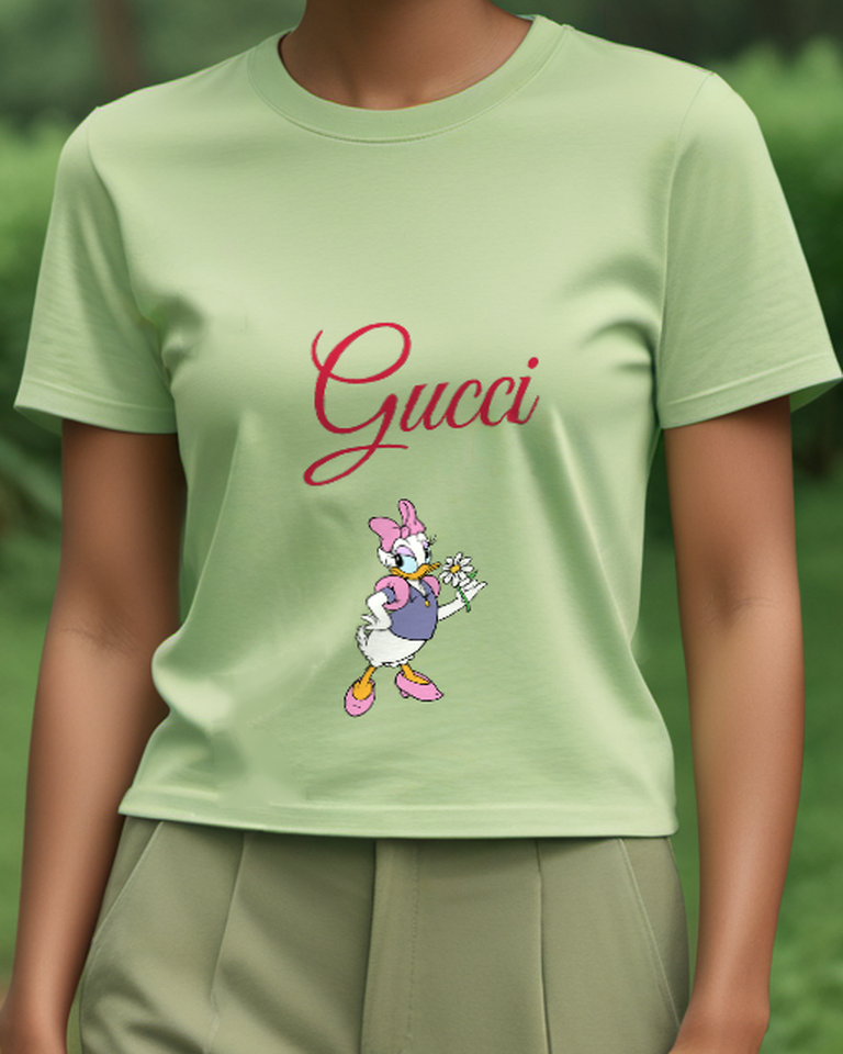 Sage Green Daisy Duck Holding A Flower Graphic T-Shirt - model wearing view
