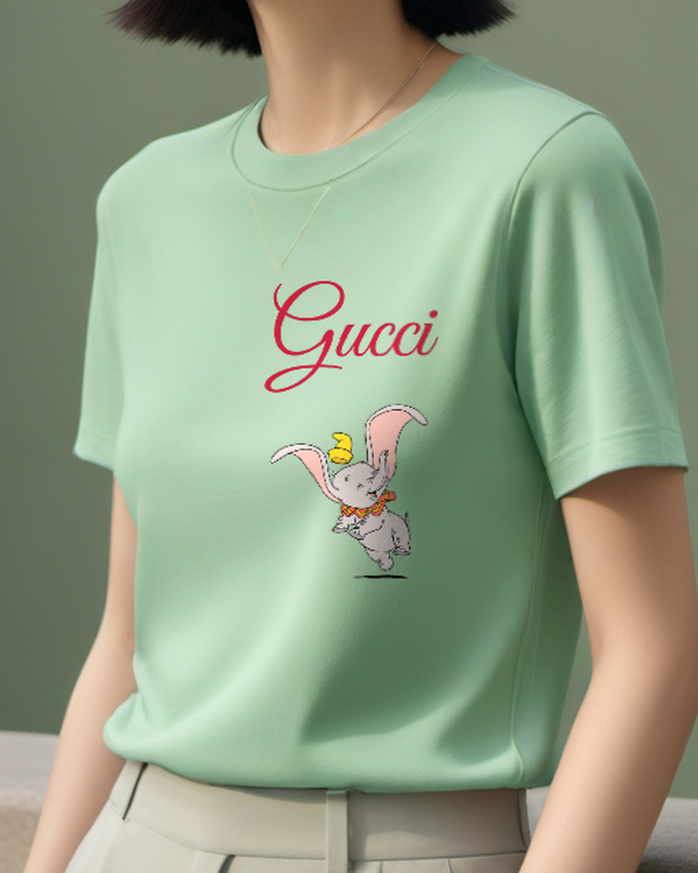 Sage Green Dumbo Jumping Joyfully With Hat Graphic T-Shirt - model wearing view