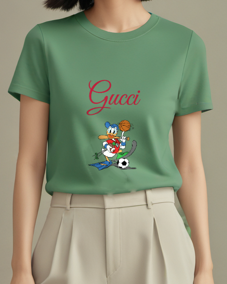 Sage Green Donald Duck Sports Multiple Items Graphic T-Shirt - model wearing view