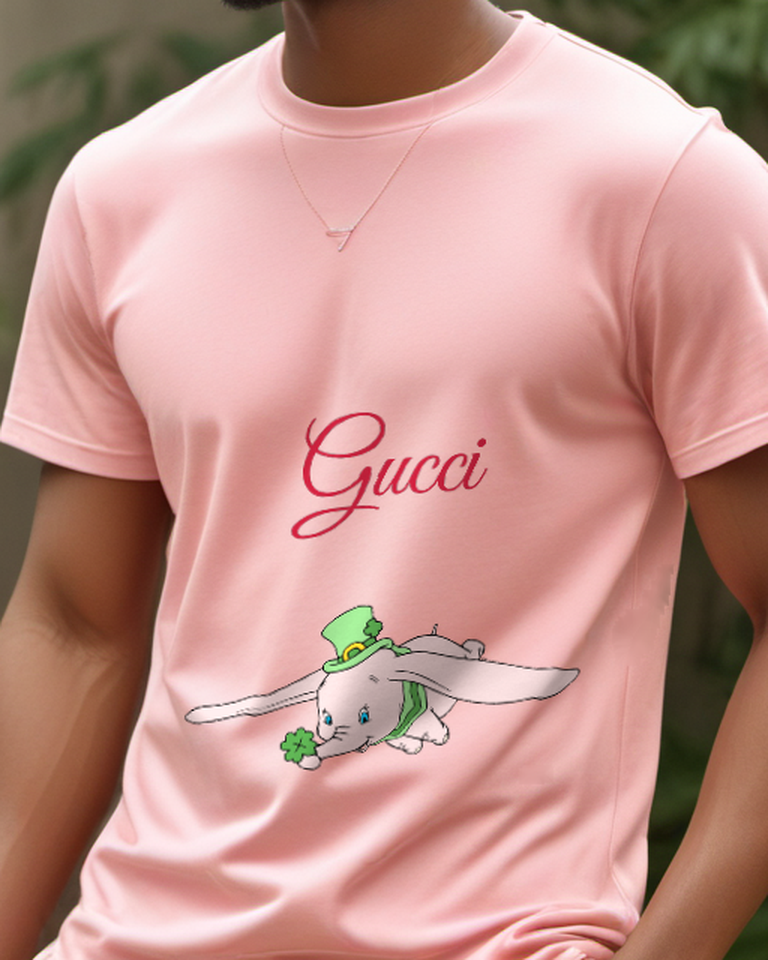 Blush Pink Dumbo In Leprechaun Hat Holding Clover Graphic T-Shirt - model wearing view