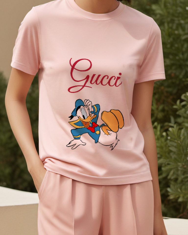 Blush Pink Donald Duck In Dynamic Running Pose Graphic T-Shirt - model wearing view
