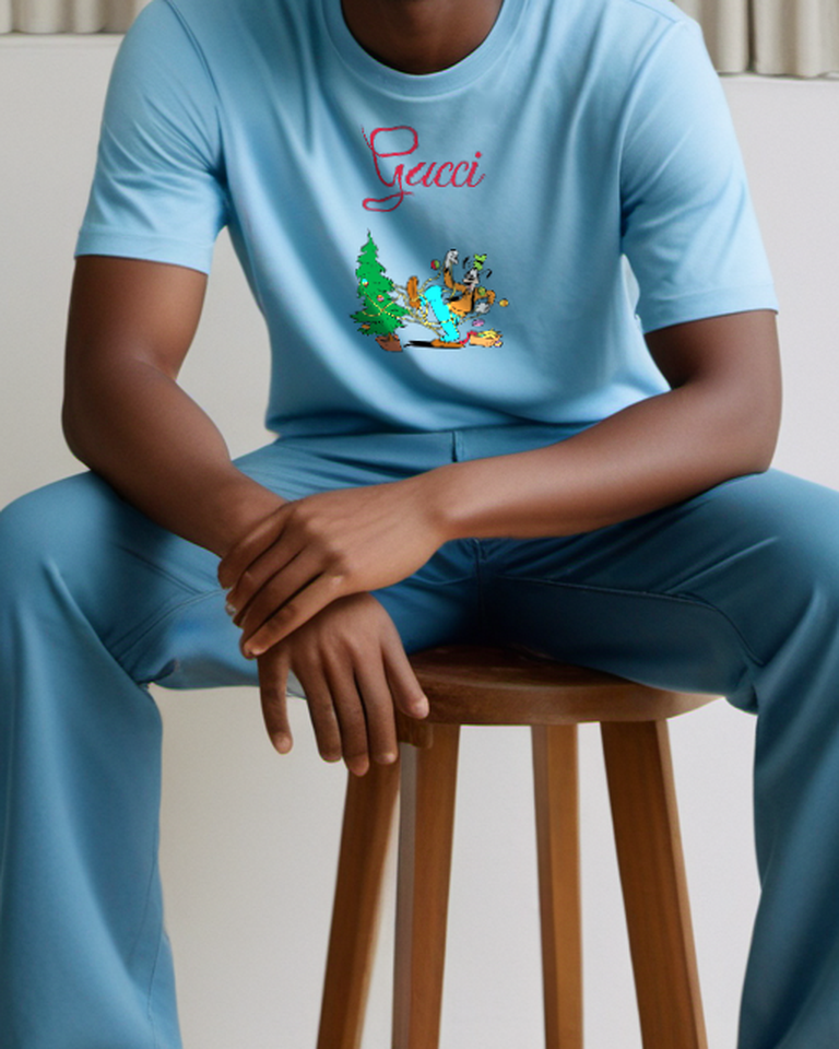 Dusty Blue Dog Beside Holiday Tree Graphic T-Shirt - model wearing view