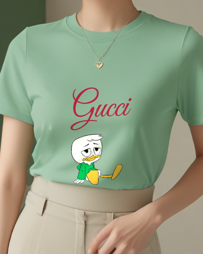 Sage Green Louie Duck Sitting Cross Legged Graphic T-Shirt - model wearing view
