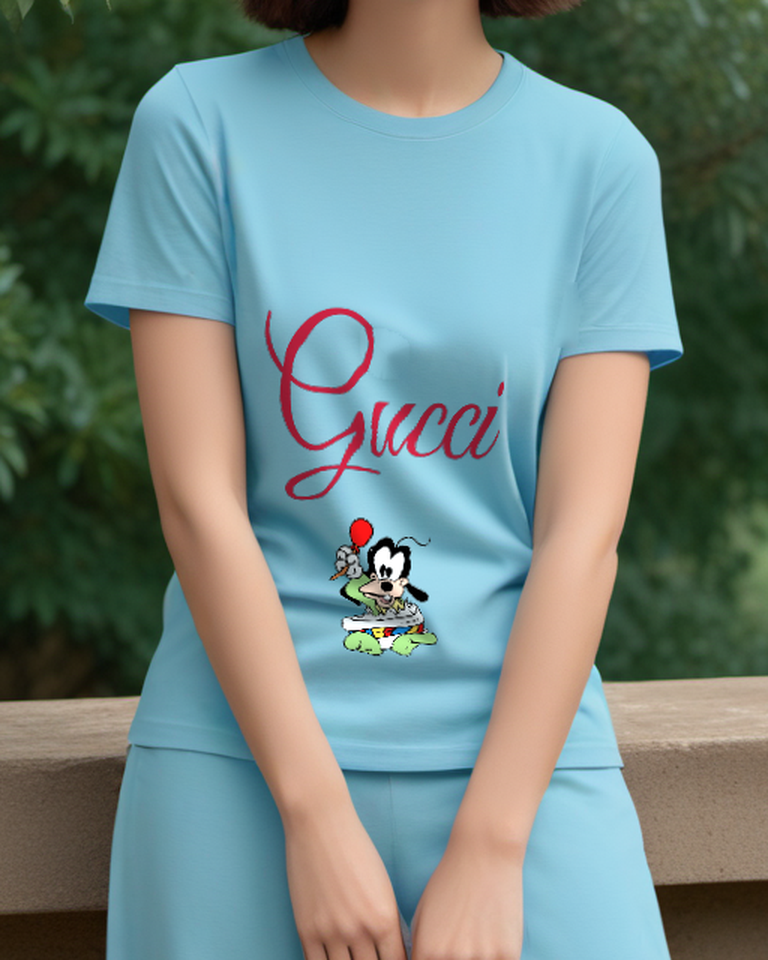Sky Blue Goofy Baby Holding Lollipop Graphic T-Shirt - model wearing view