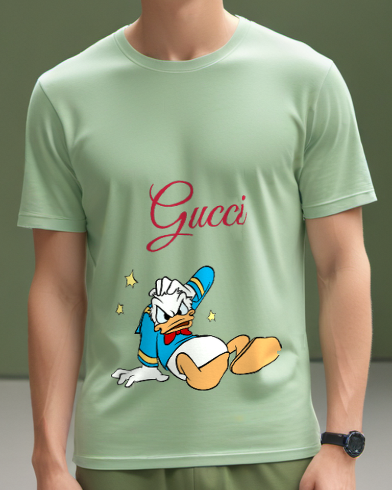 Sage Green Donald Duck Lying On Back Graphic T-Shirt - model wearing view