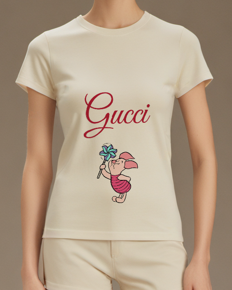 Ivory Piglet Holding Pinwheel Graphic T-Shirt - model wearing view
