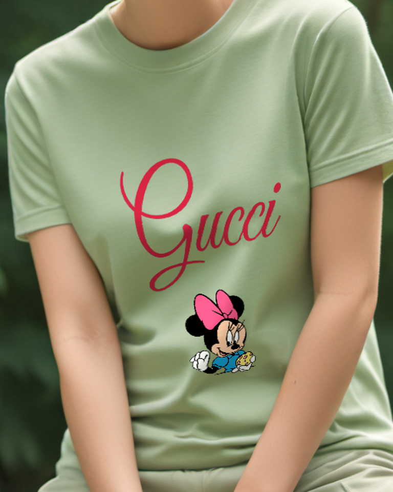 Sage Green Minnie Mouse Holding Egg Gesturing Graphic T-Shirt - model wearing view