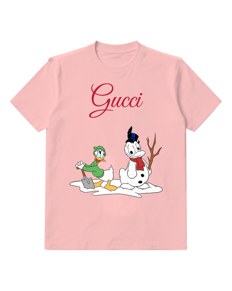 Blush Pink Donald Duck Shovels Snow Beside Snowman Graphic T-Shirt - front product view