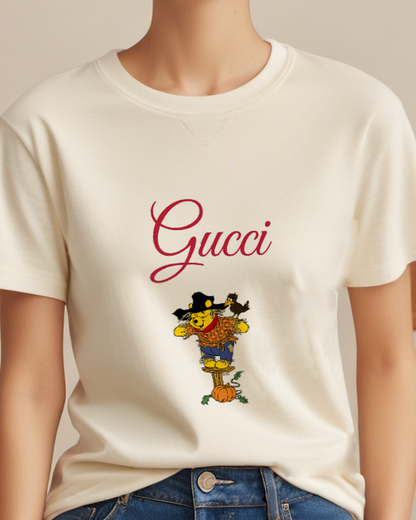 Ivory Scarecrow Bear With Crow On Shoulder Graphic T-Shirt - model wearing view
