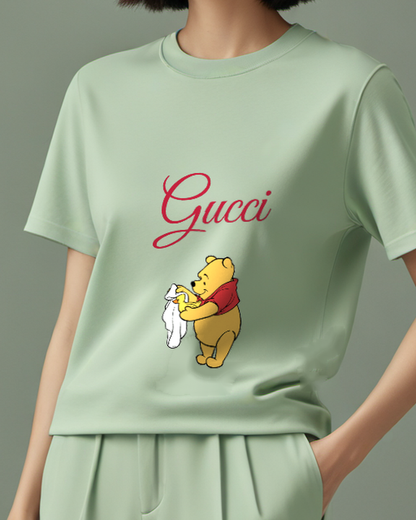 Sage Green Winnie The Pooh Holds Duckling In Towel Graphic T-Shirt - model wearing view