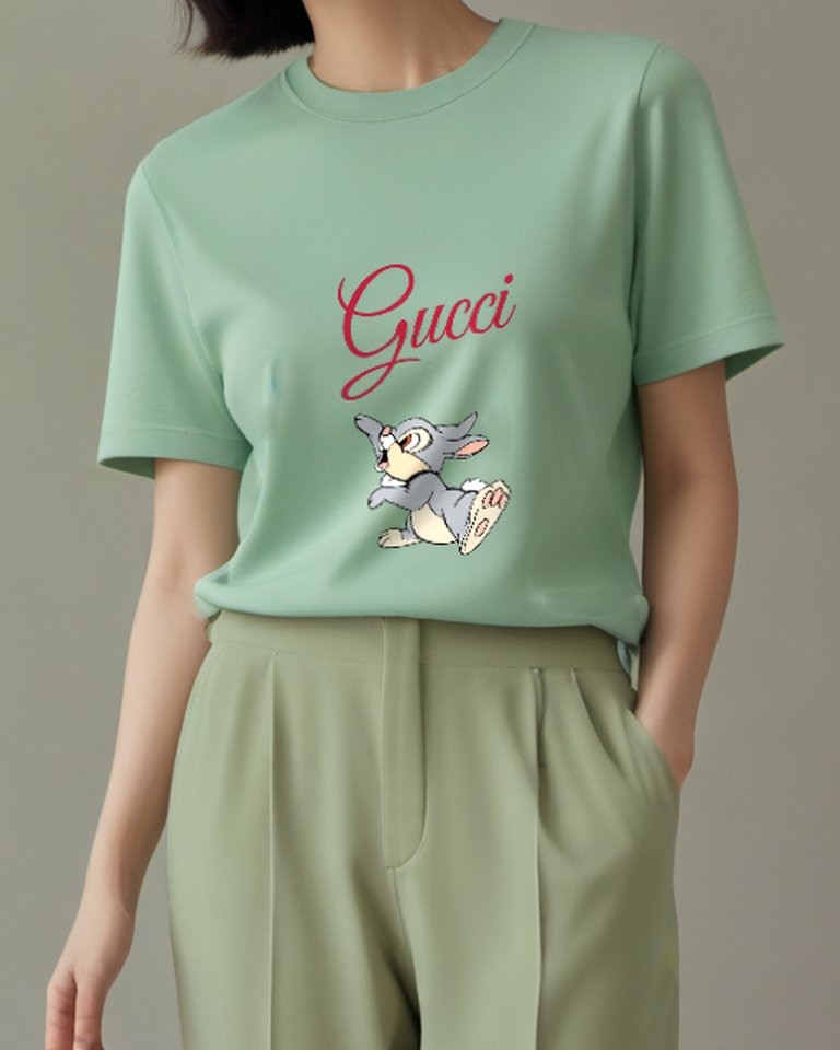 Sage Green Bambi Like Rabbit Jumping Forward Graphic T-Shirt - model wearing view